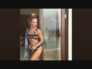 rita dakota shared a video posing in a swimsuit milf