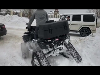 kurban omarov and teona ride an atv with a caterpillar 02 2018