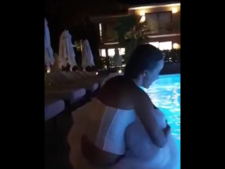 ksenia sobchak in a wedding dress plunged into the pool